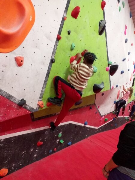 Young carers at a climbing activity centre