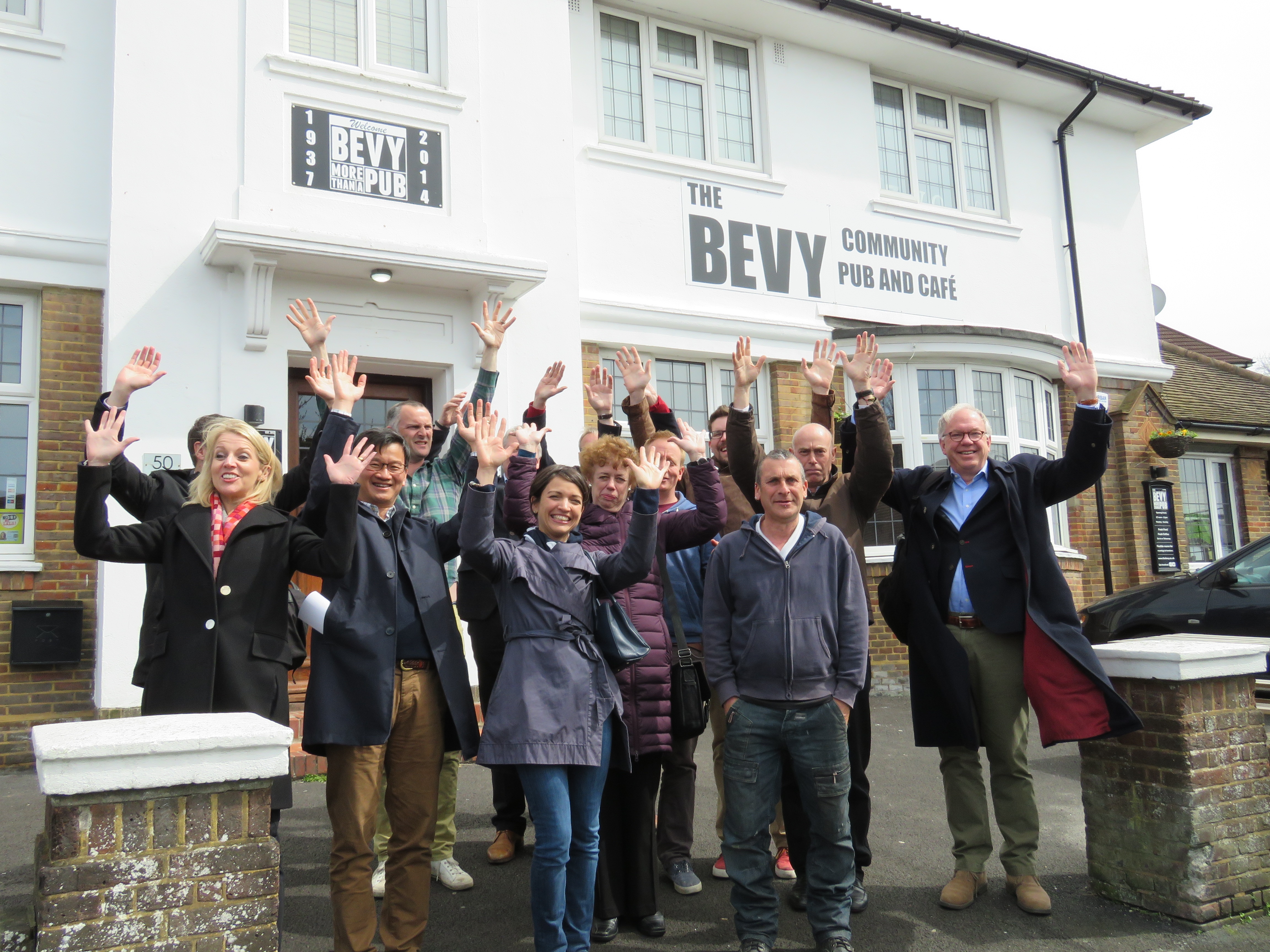 Local people celebrate the opening of The Bevy, a community-owned pub in Brighton