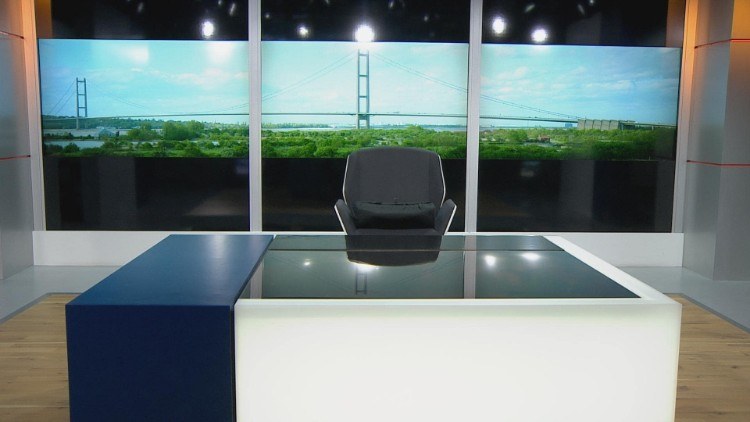 TV news studio with a view of the Humber Bridge behind