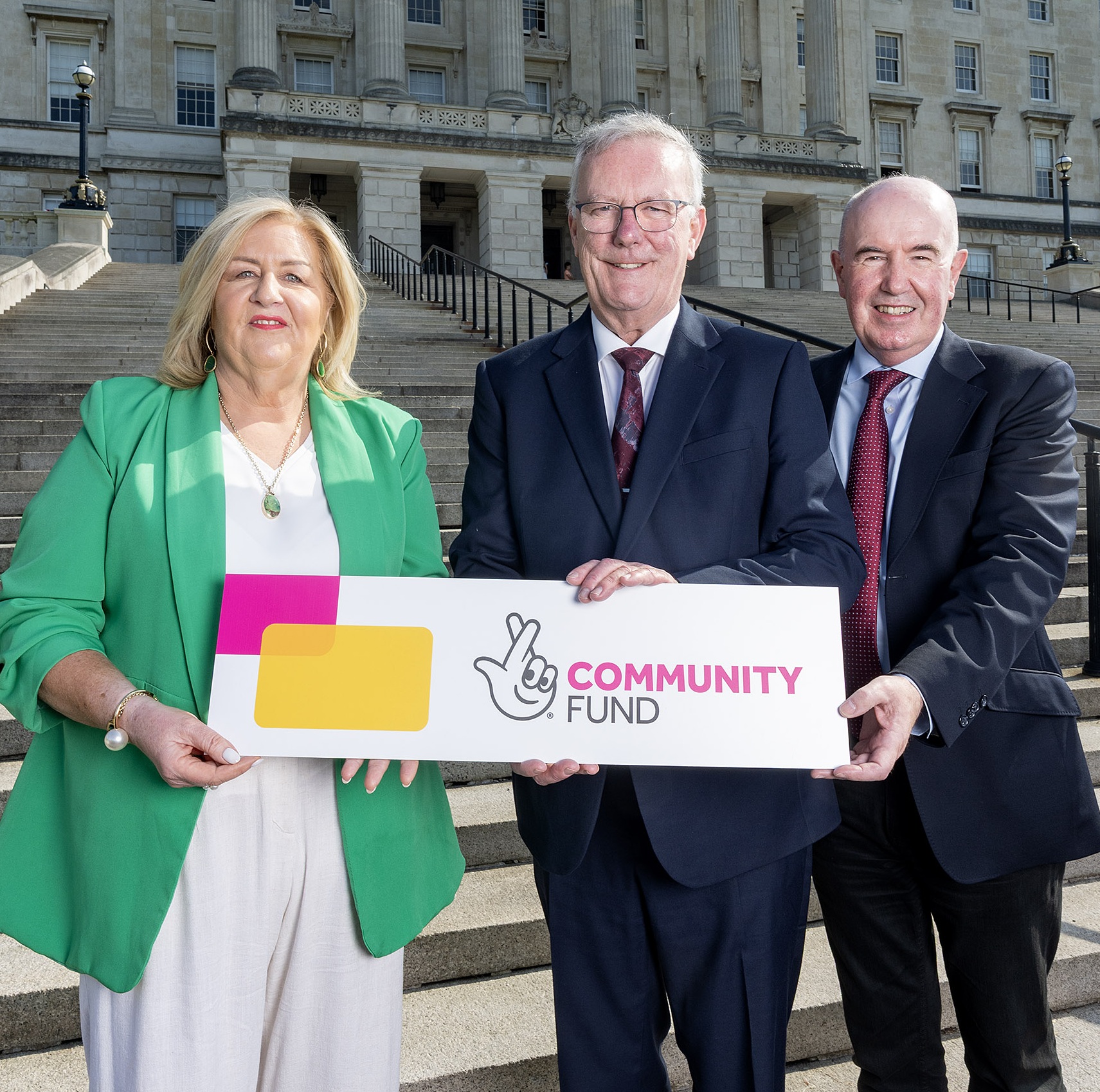 Jacinta Linden, Co-Director of the Together for Families project, Health Minister Mike Nesbitt and Paul Sweeney, Chair of the Northern Ireland Committee, The National Lottery Community Fund