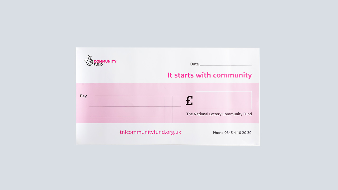 The National Lottery Community Fund Acknowledgement cheque